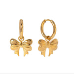 Load image into Gallery viewer, Bow Huggie Hoops
