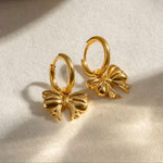 Load image into Gallery viewer, Bow Huggie Hoops
